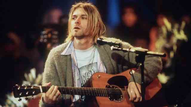 Pop Column: Actually yes "The man who didn't sell the world": Kurt Cobain at MTV Unplugged with the later $6 million guitar.