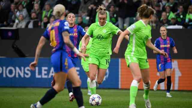 International football: There was a bit of hope again: Jill Roord (centre) scored to make it 2-0 for Wolfsburg against Barcelona - but the win wasn't enough to make it into the final.