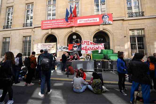Students block access to the Sciences Po site located rue Saint-Guillaume, April 14, 2022.