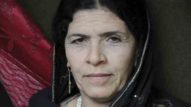 travel book "Finding Afghanistan": The longest-serving female police officer in Kunduz, 2009.