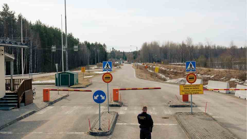 A Finnish soldier guards the closed crossing with Russia near Simpele Municipality