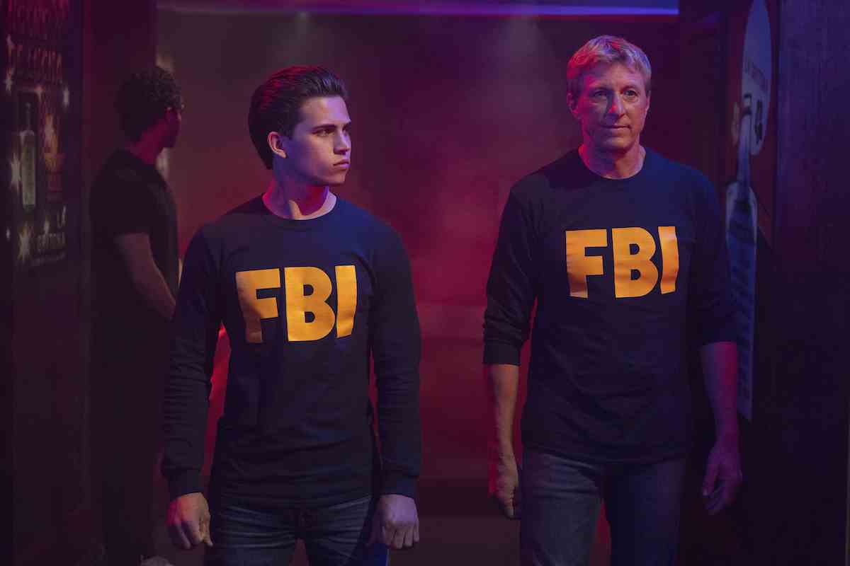 Johnny and Robby wear FBI shirts in Season 5 of Cobra Kai