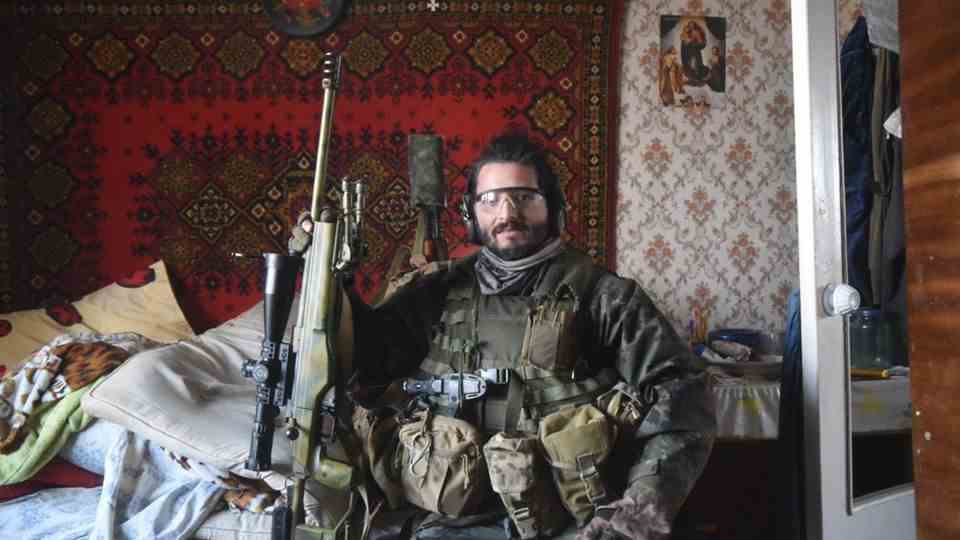 Sniper Vali had his picture taken in full gear for the Ukrainian armed forces