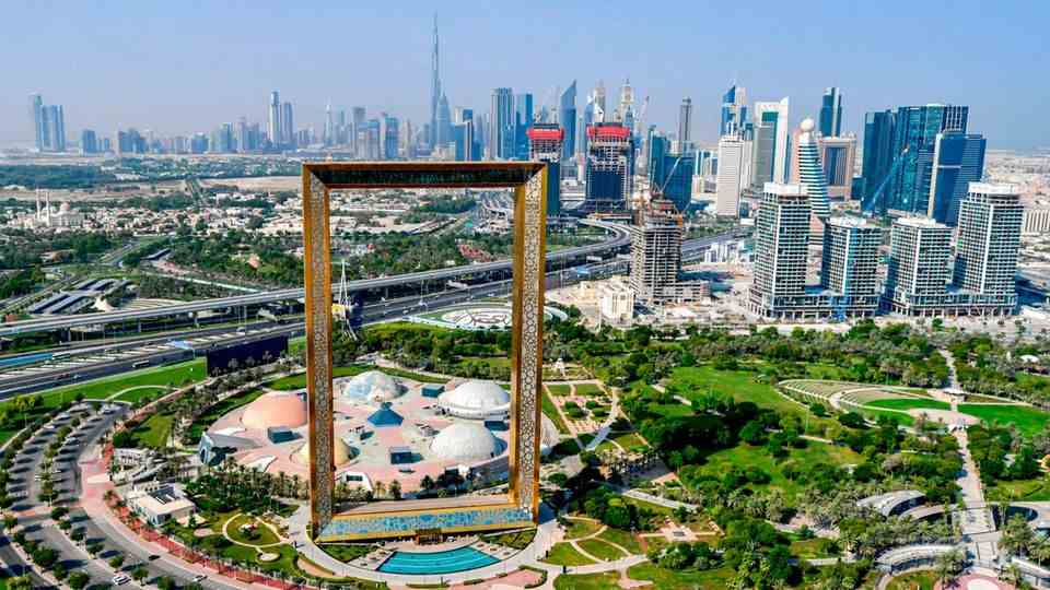 Image 1 of 13 of the photo series to click: The architect Fernando Donis has designed an unusual vantage point with the Dubai Frame, an oversized picture frame.  The two 150 meter high towers are connected by a 93 meter long bridge with windows and a glass floor - for views of the skyline and the Zabeel Park below.  Info: www.thedubaiframe.com