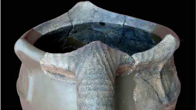 Archaeology: Reconstruction of one of the cups apparently thrown into the fire at burials.