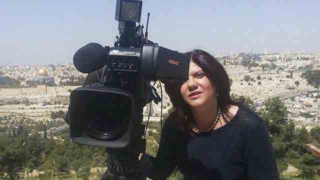 Middle East: Shireen Abu Akleh at work - she has reported for Al Jazeera since 1997.