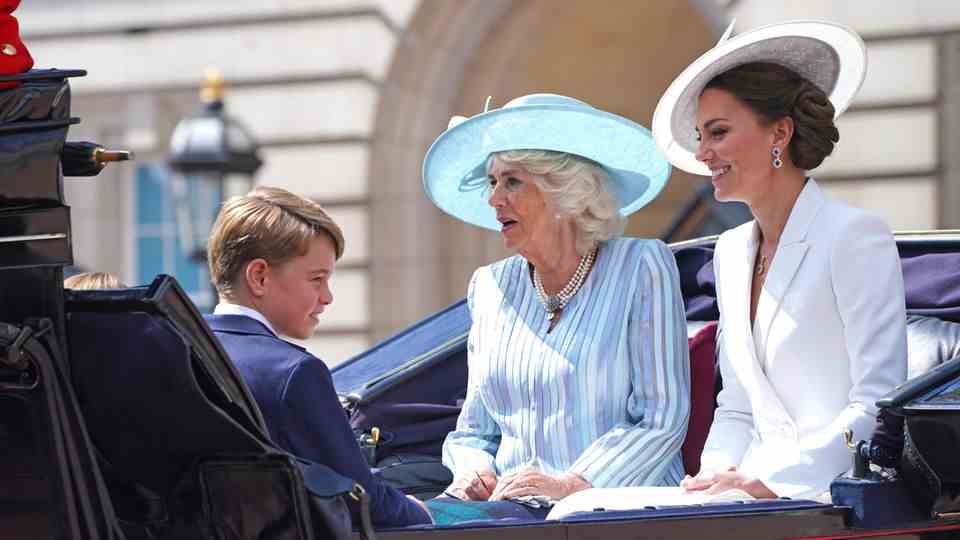 This is what royal fans have been waiting for: members of the royal family meet for the military parade "Trooping the Colour" a celebration of the birthday and 70th anniversary of Queen Elizabeth II's throne in London.  Duchess Camilla shared the carriage with Duchess Kate and their children George, Charlotte and Louis.