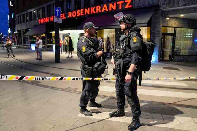 Police secure the scene of a shooting in downtown Oslo on June 25, 2022.