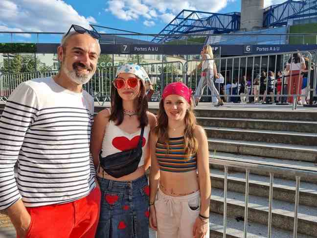 Christophe, 48, and his two daughters Lilou and Clémentine, 14 and 15, at the Harry Styles concert on Tuesday July 5, 2022, in Paris.