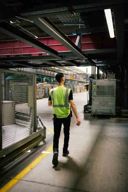 Integration: Today, the native Syrian keeps an eye on the work of his colleagues in the large parcel hall.