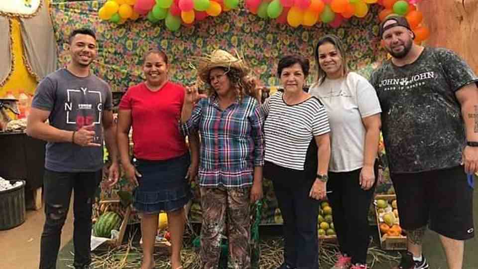 Founder Dona Carmen (center) with members and helpers of the Oficina Cultural da Mulher da Comunidade Menino Chorão