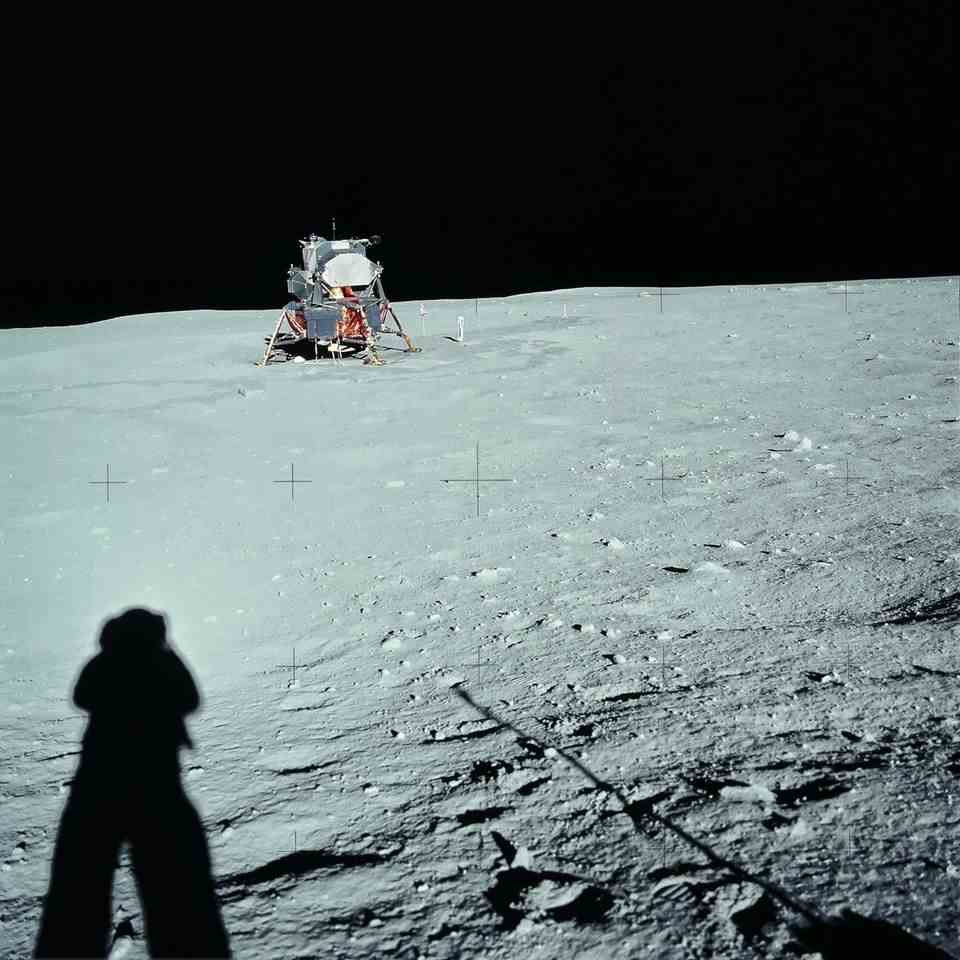 July 20, 1969: Neil Armstrong's shadow on the moon with the lunar module in the background.