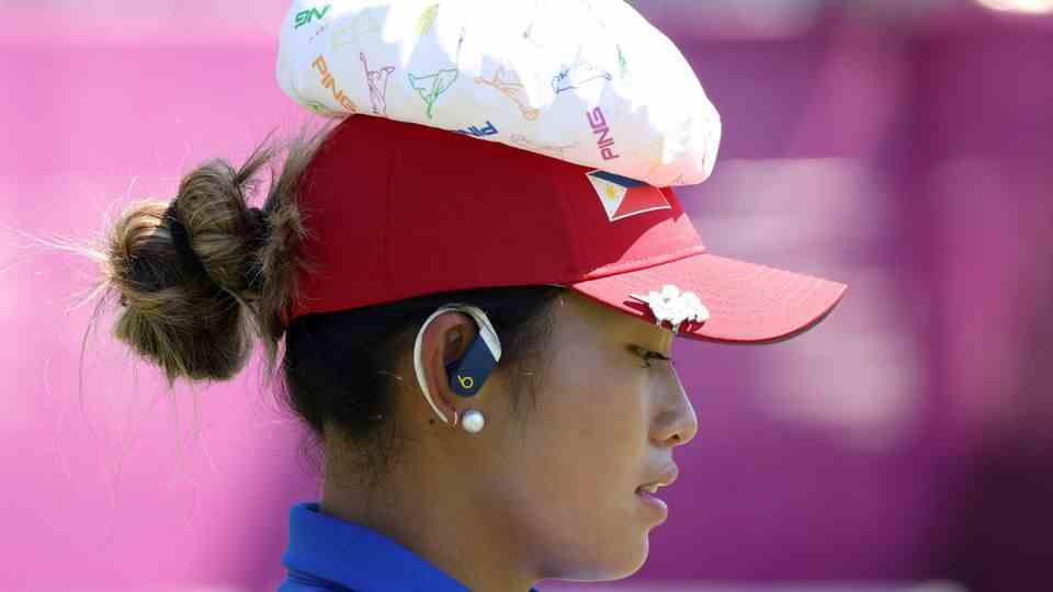 Bianca Pagdanganan from the Philippines cools off with an ice pack on her head