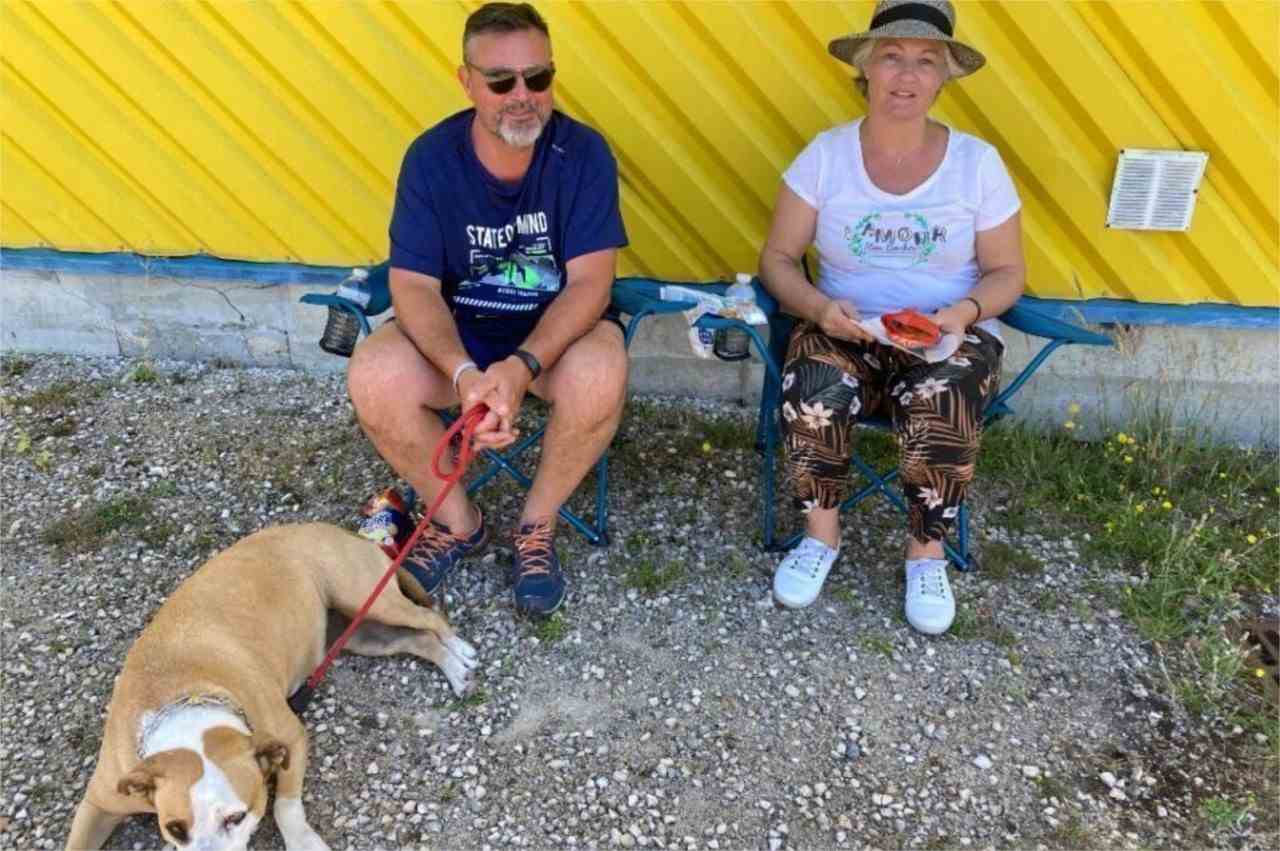 Philippe, Sandrine and their dog.  They are among the campers who had to evacuate their campsite because of the fire in La Teste-de-Buch. 
