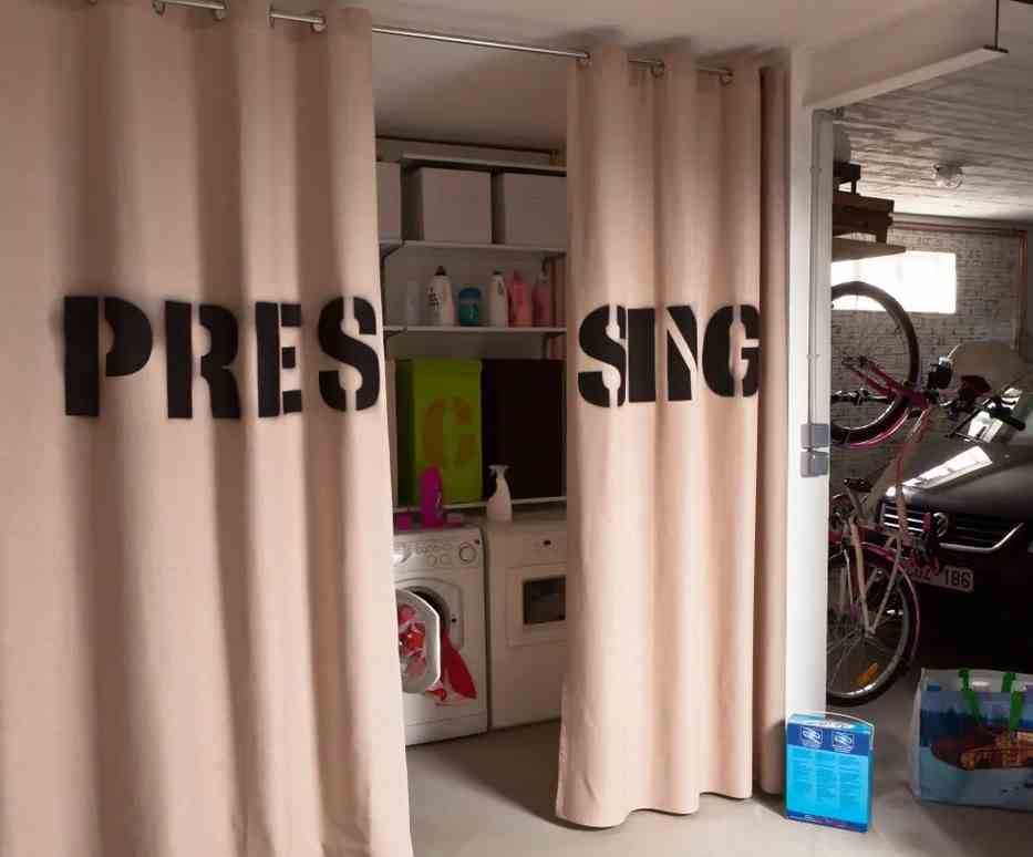 A Laundry Room Isolated By Curtains 