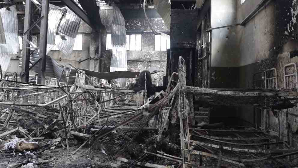 View of the interior of a destroyed barracks in Olenivka