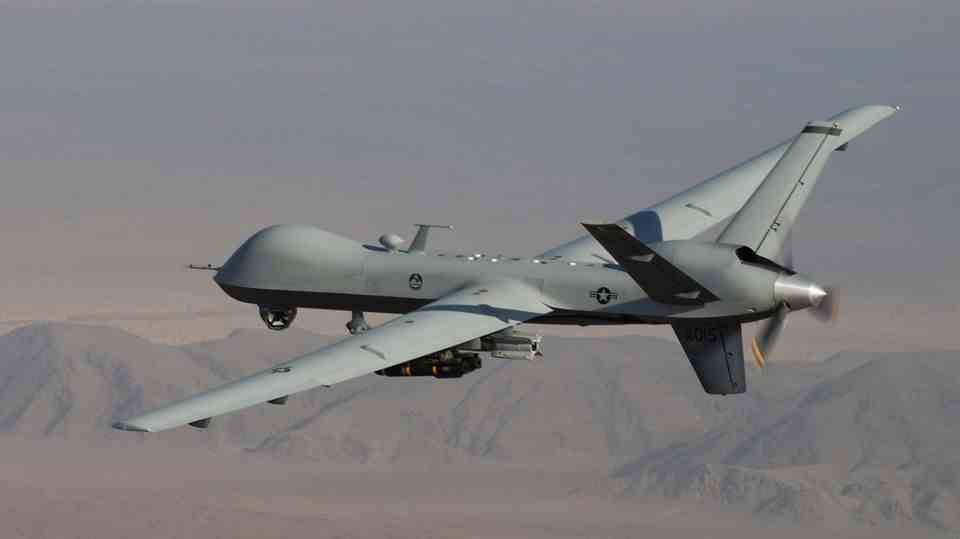 US MQ-9 Reaper drone armed with Hellfire missiles and BU-12 Paveway bombs.