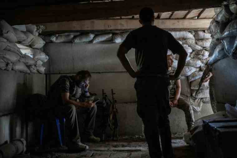 Ukrainian soldiers in an underground shelter near the front line on August 20, 2022 in southern Ukraine (AFP / BULENT KILIC)