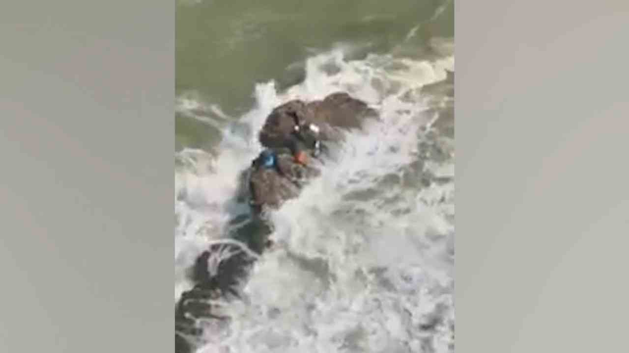 Five fishermen rescued from Rock Island They stayed there for hours