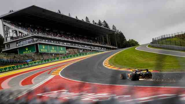 Formula 1: High up: Daniel Ricciardo races up the Eau Rouge in his McLaren.