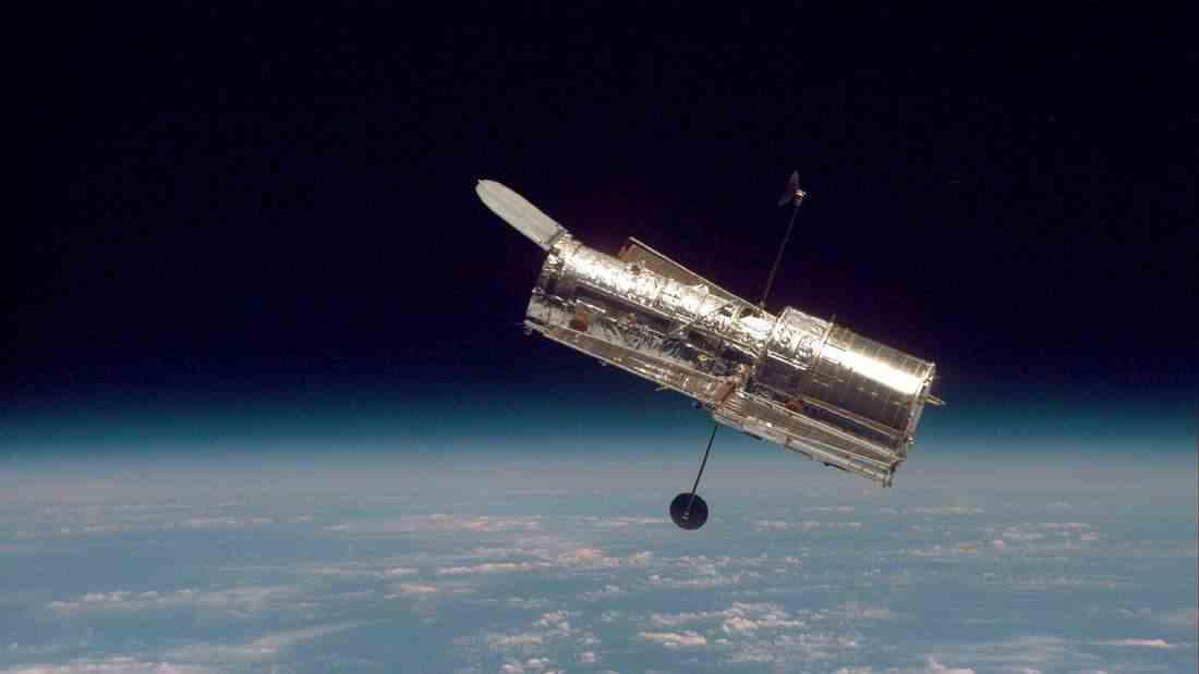 The NASA and ESA Hubble Space Telescope has been in orbit since 1990.  At an altitude of about 500 kilometers, it looks deep into space - but occasionally also photographs the planets of the solar system.