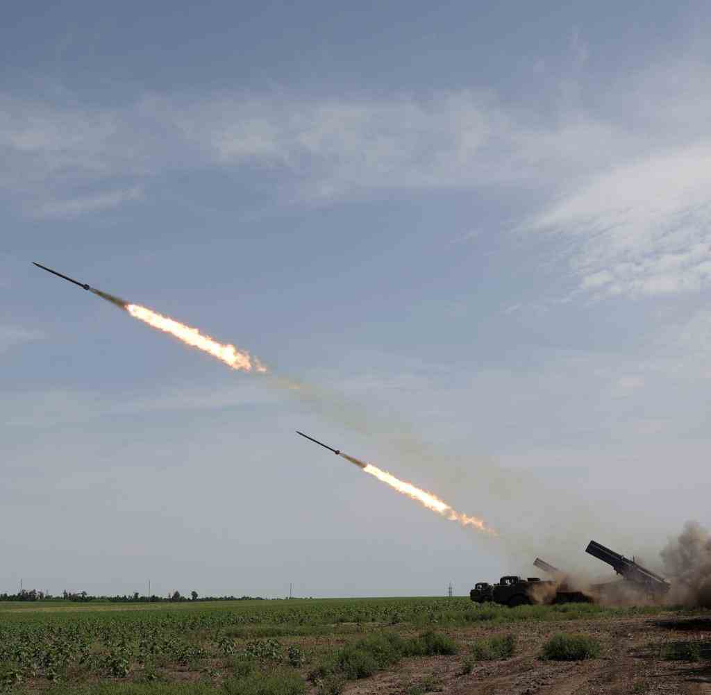 TOPSHOT - Ukrainian artillery unit fires with a BM-27 Uragan, a self-propelled 220 mm multiple rocket launcher, at a position near a frontline in Donetsk region on August 27, 2022, amid the Russian invasion of Ukraine. (Photo by Anatolii Stepanov / AFP)