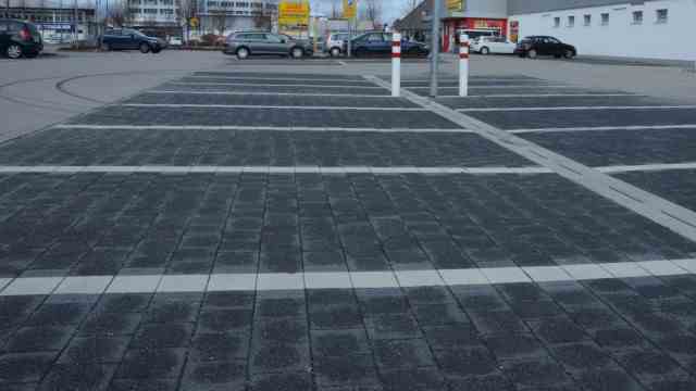 Global warming: sealed Germany: parking lot in front of a shopping center.