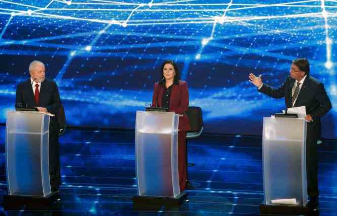 Candidates Luiz Inacio Lula da Silva, of the Workers' Party, Simone Tebet, of the MDB Party, and Jair Bolsonaro, the incumbent President, during the first televised debate of the Brazilian presidential campaign, in Sao Paulo, on August 29, 2022. 