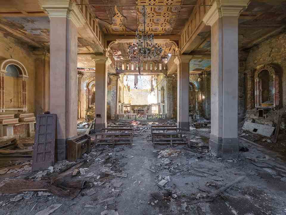 This chapel in Italy was destroyed by an earthquake years ago.  Photographer Francis Meslet has visited abandoned churches in Europe and his shots feature in the book "Mind Travels" released.