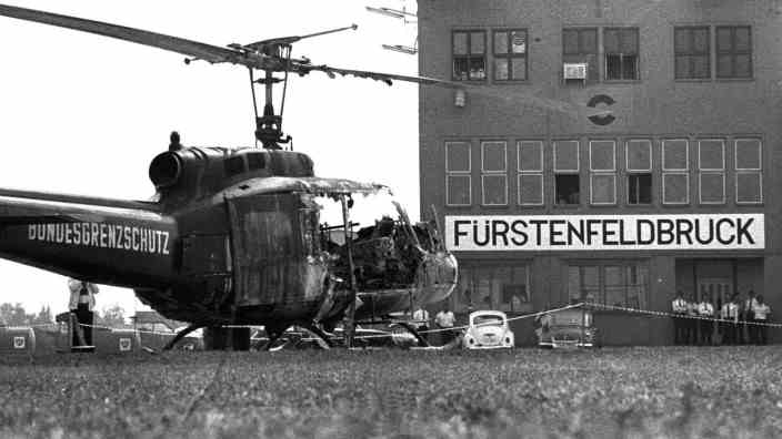Historical live blog about the 1972 Olympics: The burned-out helicopter at Fürstenfeldbruck Airport the morning after the bloody outcome of the hostage-taking.