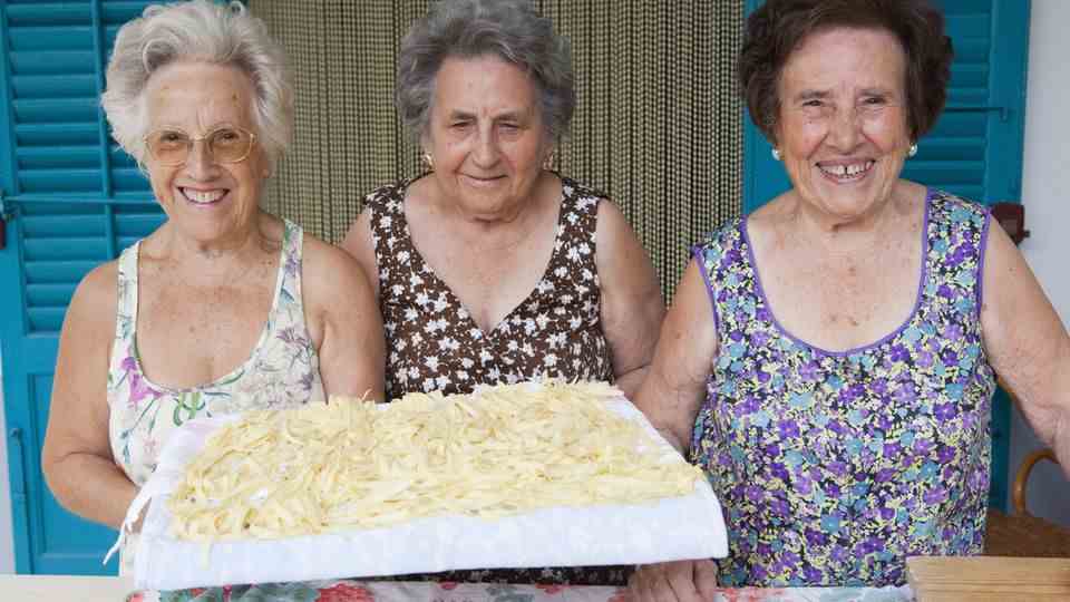 If you see these three ladies outside an Italian restaurant and you're showing them the pasta you've just kneaded, go in - and eat pasta.