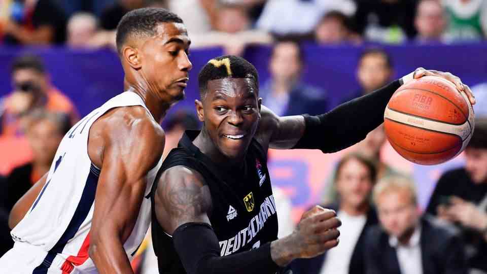 Lots of spectacle: Germany's Dennis Schröder (right) leaves France's Theo Maledon standing