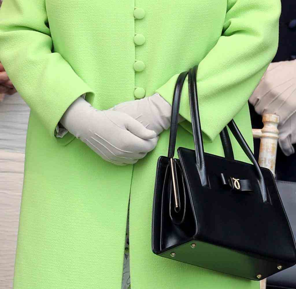 Essential accessory: the Queen's handbag