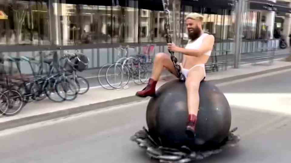 Tel Aviv: Artist races through the city on a wrecking ball – and causes a stir