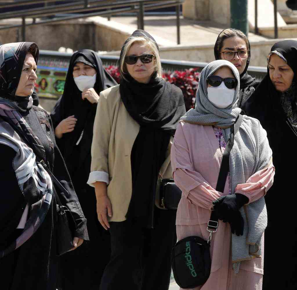 With headscarves: women in Tehran, August 2022
