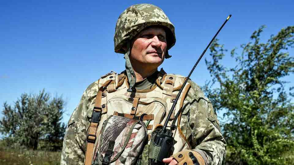 Ukraine War: A Ukrainian soldier holds a radio for communication