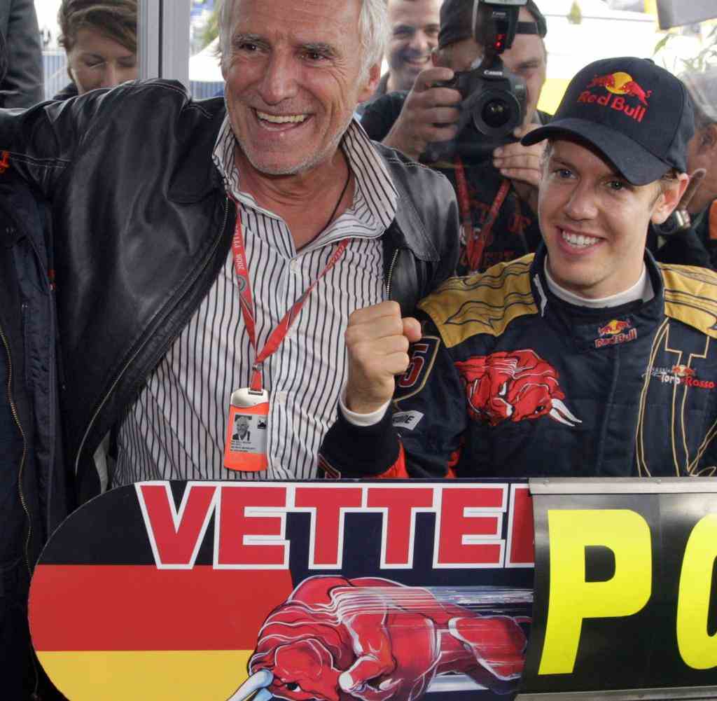 Formula 1 driver Sebastian Vettel (right) from Germany and Dietrich Mateschitz (centre) at the 2008 Italian GP in Monza