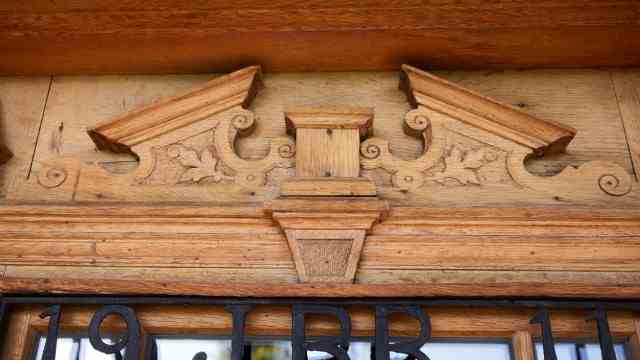Unusual hobby: Detail of the original Zisthof front door.  The Bauers found them in the attic while renovating the house.