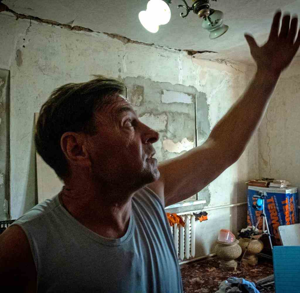 Vitaly Taschenko in his house in Bucha