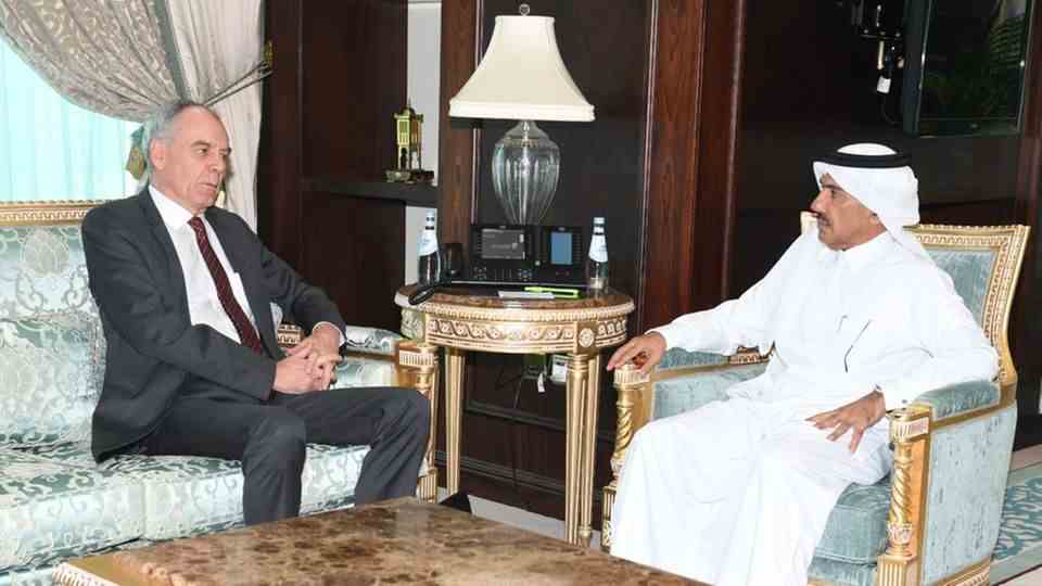 This photo, distributed by the Qatari Ministry of Foreign Affairs, shows Ambassador Dr.  Claudius Fischbach (left)
