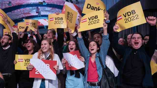 Austria: Alexander Van der Bellen's supporters celebrate his victory in Vienna on Sunday.