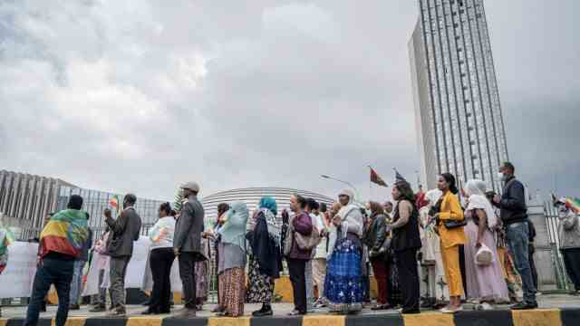 Horn of Africa: Anti-war protesters gather outside the African Union headquarters in Addis Ababa on October 4.