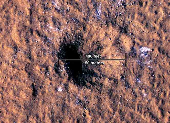 The crater about 150 meters in diameter and 20 meters deep, caused on Mars by a meteorite, on December 24, 2021.