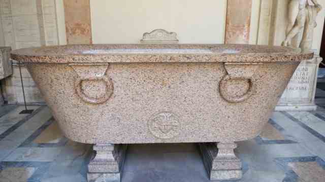 Bathtub: Stone bathtub exhibited in the Vatican Museums: After the fall of the Roman Empire, baked and brick bathtubs almost completely disappeared in Europe.  An exception were the tubs of popes.