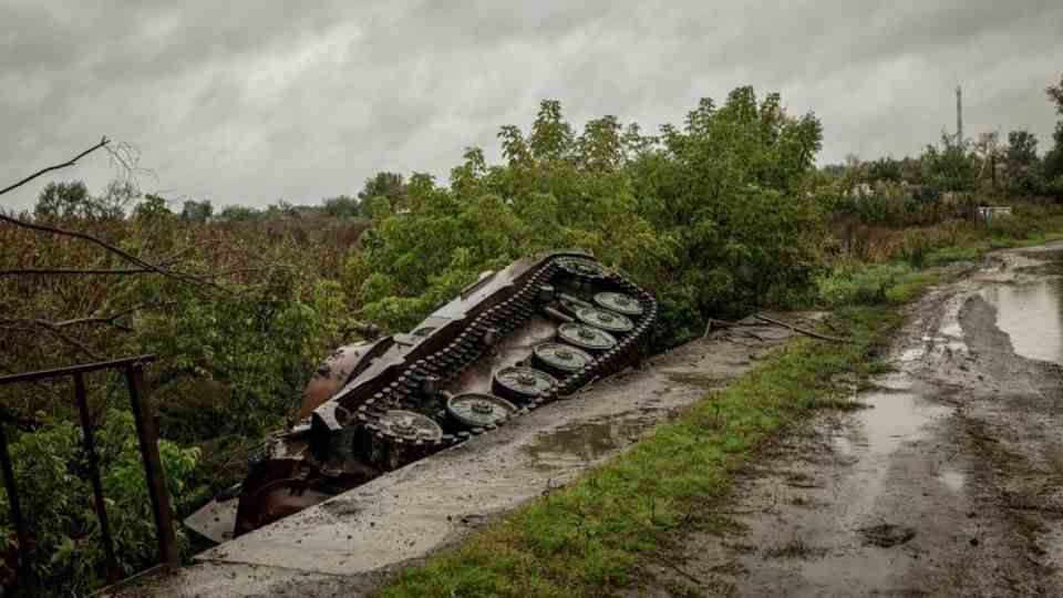 A Russian tank lies in the ditch