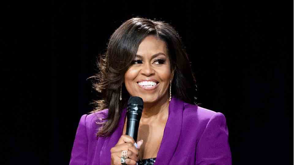 This is how many remember Michelle Obama: with straight hair.  Here is a photo from 2019. 
