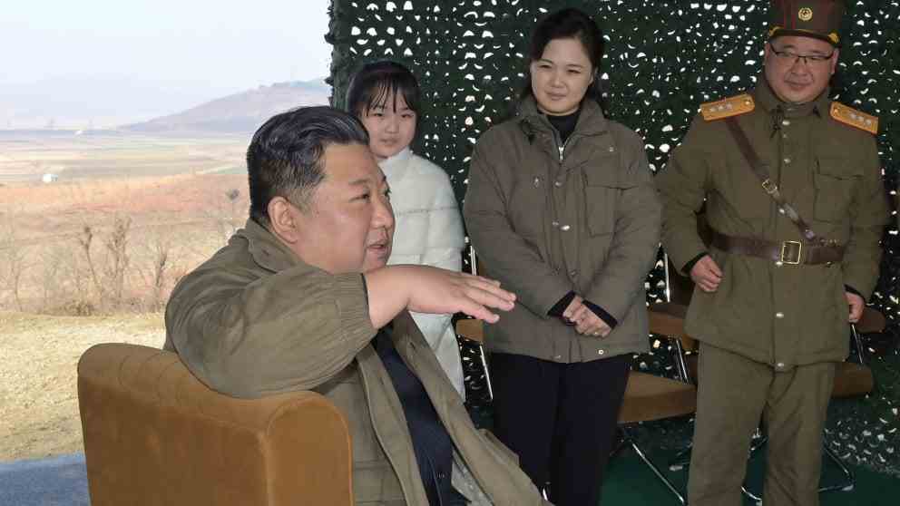 Dictator Kim Jong-un, his daughter Ju-ae and his wife Ri Sol-ju (from left) at the missile test site