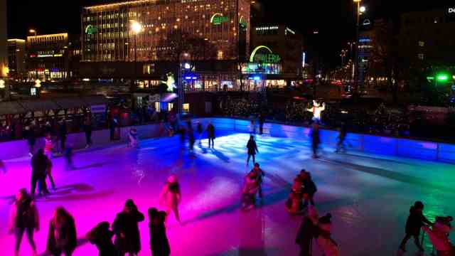 Free time: Ice skaters do their laps at the colorfully illuminated Munich Ice Magic at the Stachus.