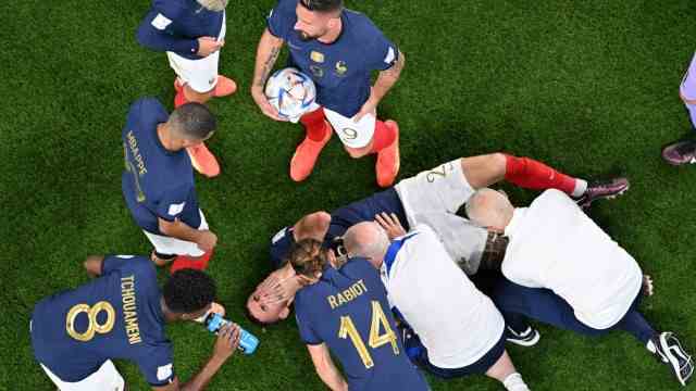 France vs Australia: Another name on the injury list: Lucas Hernandez is down in pain.