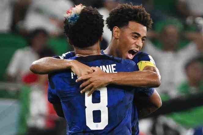 Captain Tyler Adams falls into the arms of Weston McKennie, during the victory of the United States against Iran (1-0), on November 29, 2022, at Al-Thumama stadium, in Qatar.